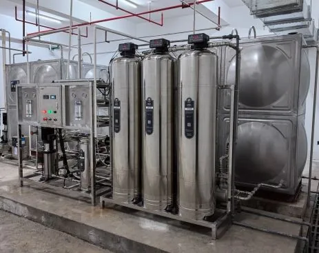 Stainless water-treatment vessels, controls and storage tanks used to illustrate a medical and biotech high-purity water system