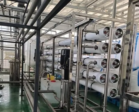 Industrial RO membrane housings, pumps and stainless-steel piping in an anonymous boiler make-up reference