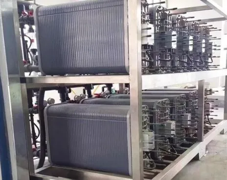 Plate-style water treatment modules, process pipework and supporting frame used as reference configuration imagery